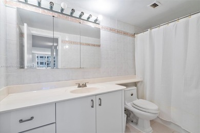 Sunlit and immaculate 1,225 sq ft oceanfront 1BR + den / 2BA