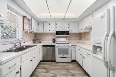 PRICED TO SELLe find your North Palm oasis. Nestled right in the - photo 1