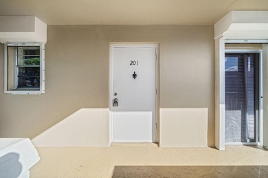 PRICED TO SELLe find your North Palm oasis. Nestled right in the - photo 2