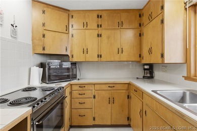 Rare opportunity to own a flat, step-free lakefront lot in the - photo 15