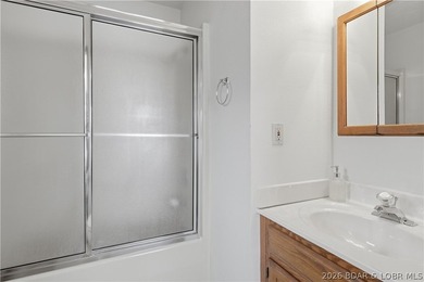 Rare opportunity to own a flat, step-free lakefront lot in the - photo 20