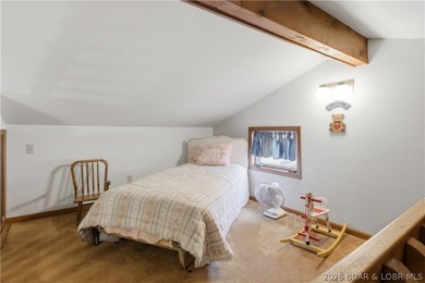 Rare opportunity to own a flat, step-free lakefront lot in the - photo 25