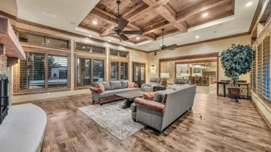 Welcome to 117 Hansma Way, a breathtaking custom ranch estate in