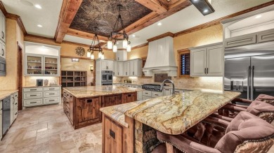 Welcome to 117 Hansma Way, a breathtaking custom ranch estate in