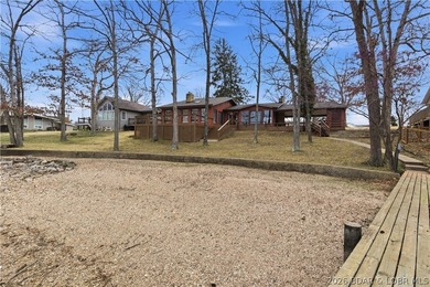 Rare opportunity to own a flat, step-free lakefront lot in the - photo 38