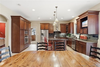 Luxury lake living in prestigious Porto Cima. This exceptional - photo 14