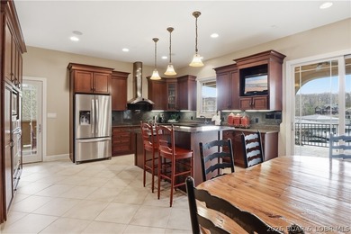 Luxury lake living in prestigious Porto Cima. This exceptional - photo 15