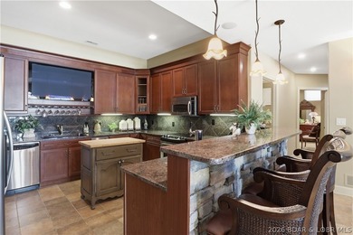 Luxury lake living in prestigious Porto Cima. This exceptional - photo 20