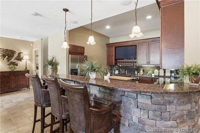 Luxury lake living in prestigious Porto Cima. This exceptional - photo 21