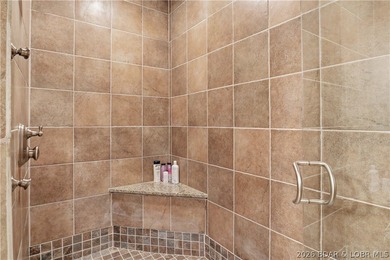 Luxury lake living in prestigious Porto Cima. This exceptional - photo 49