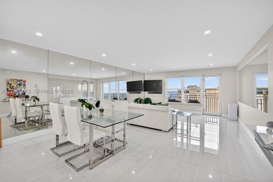 Mesmerizing views from this FULLY RENOVATED corner unit with - photo 5