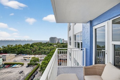 Mesmerizing views from this FULLY RENOVATED corner unit with - photo 10