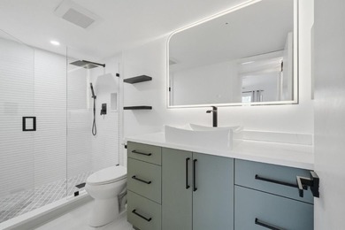 Welcome to this impeccably renovated 2-bedroom, 2-bath residence - photo 1