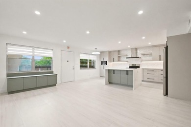 Welcome to this impeccably renovated 2-bedroom, 2-bath residence - photo 4