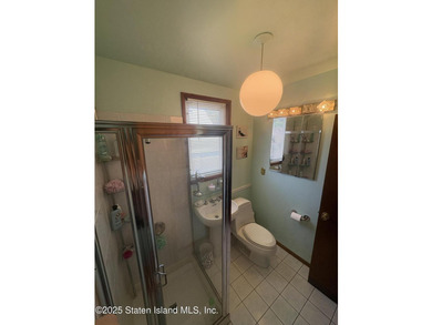 THIS BEAUTIFULLY MAINTAINED 2 FAMILY DETACHED HOME ON ONE OF THE - photo 15