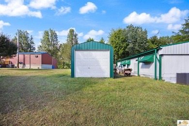 Large shop on site and adjacent urestricted lot with water and - photo 7