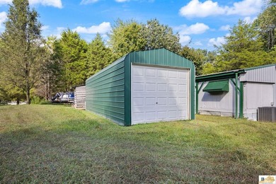 Large shop on site and adjacent urestricted lot with water and - photo 8