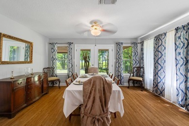 Enjoy morning coffee in your sunroom overlooking the private - photo 9