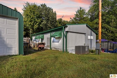 Large shop on site and adjacent urestricted lot with water and - photo 9