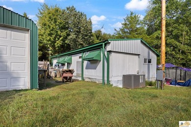 Large shop on site and adjacent urestricted lot with water and - photo 10