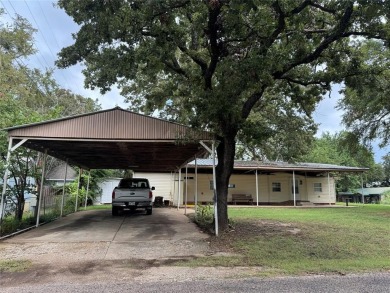 Lake Home For Sale in Gordonville, Texas