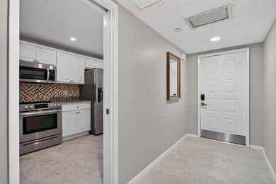 Move-in ready 2BR/2BA Palm Aire condo with expansive views. The