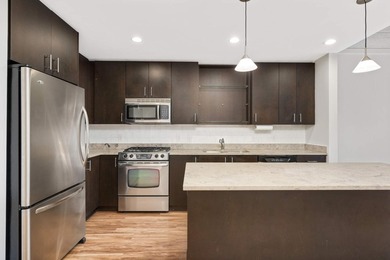 This stylish 1 bed condo at Cobalt offers an unmatched level of - photo 9