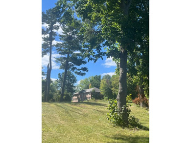 This property lies amongst mature trees with beautiful views of - photo 18