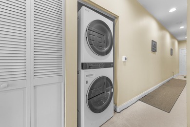 Welcome to this 2-bedroom, 2-bathroom first-floor condo located