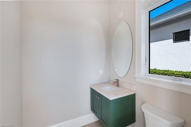 Discover a serene lakefront sanctuary in one of Naples' most - photo 38