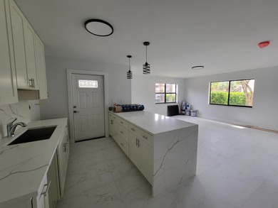 I am pleased to present this fully renovated, with new - photo 2