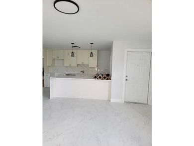 I am pleased to present this fully renovated, with new - photo 3