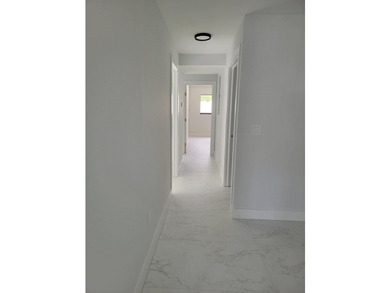 I am pleased to present this fully renovated, with new - photo 7