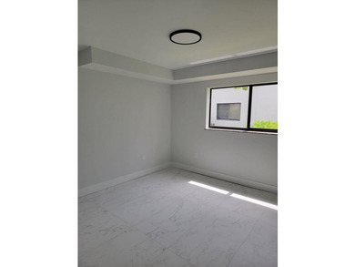 I am pleased to present this fully renovated, with new - photo 9