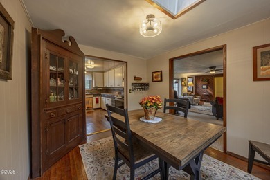 Enjoy the feel of country living on this .60-acre property just