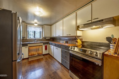 Enjoy the feel of country living on this .60-acre property just