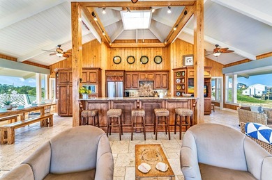 *Front Row* is one of the most breath-taking gulf front homes on - photo 20