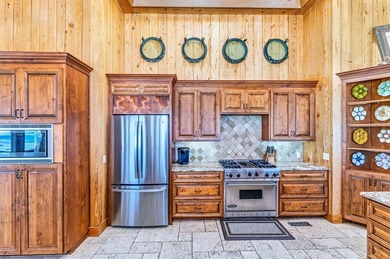 *Front Row* is one of the most breath-taking gulf front homes on - photo 21