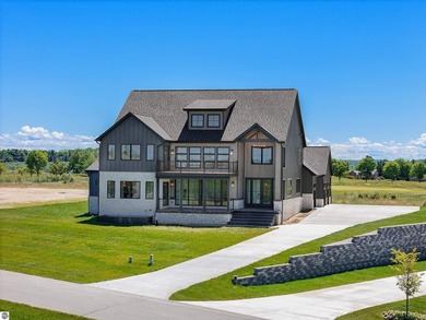Commanding panoramic views of East Grand Traverse Bay from - photo 1
