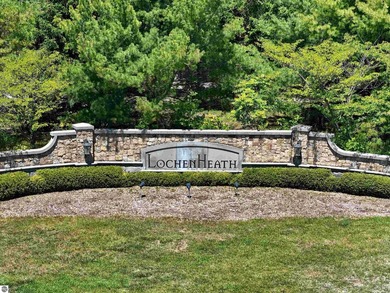 Commanding panoramic views of East Grand Traverse Bay from - photo 2