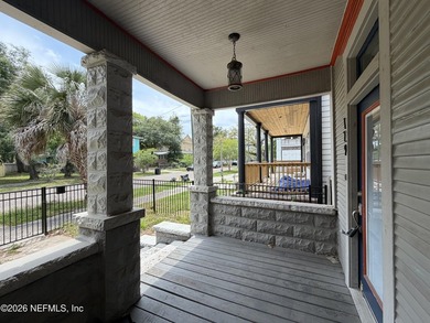 Potential of turning it into 2 family home! Located in the - photo 3