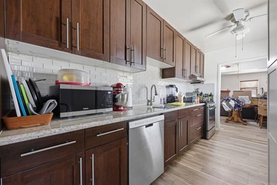 Opportunity awaits in the desirable Paradise Hills Plaza area! - photo 24