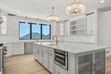 Commanding panoramic views of East Grand Traverse Bay from - photo 4