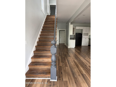 Potential of turning it into 2 family home! Located in the - photo 5