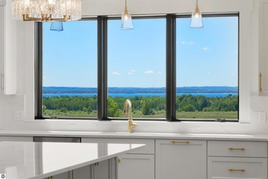 Commanding panoramic views of East Grand Traverse Bay from - photo 5