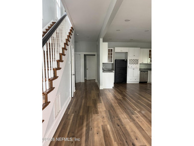 Potential of turning it into 2 family home! Located in the - photo 6