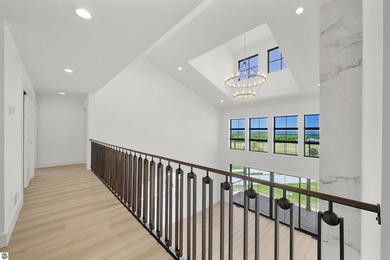 Commanding panoramic views of East Grand Traverse Bay from - photo 7