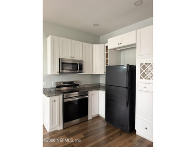 Potential of turning it into 2 family home! Located in the - photo 8
