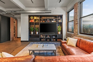 Statement residence in Milwaukee's Historic 3rd Ward! The foyer - photo 9