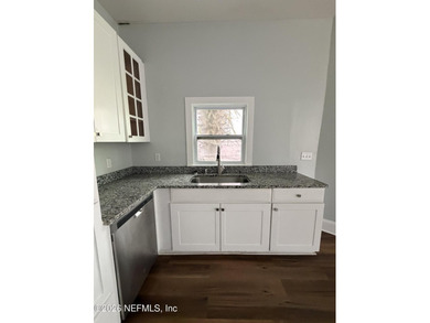 Potential of turning it into 2 family home! Located in the - photo 9